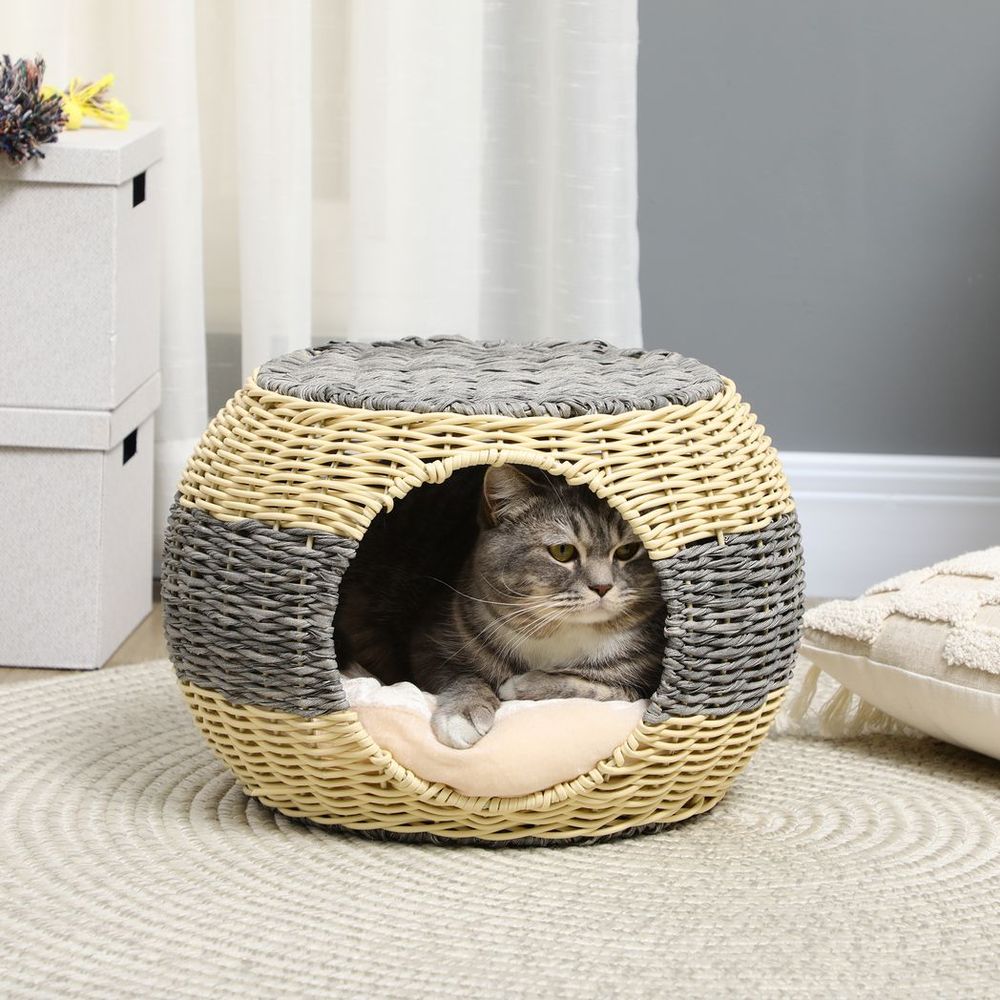cat relaxing inside of Cat Bed Wicker